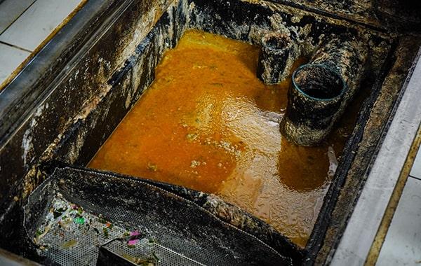 putting off grease trap cleaning can lead to foul odors, clogs, and even fines for non-compliance with regulations