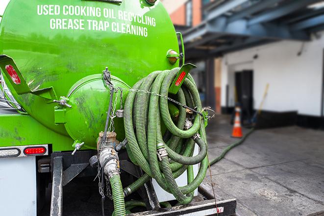 a pump truck emptying a grease trap in Mohave Valley